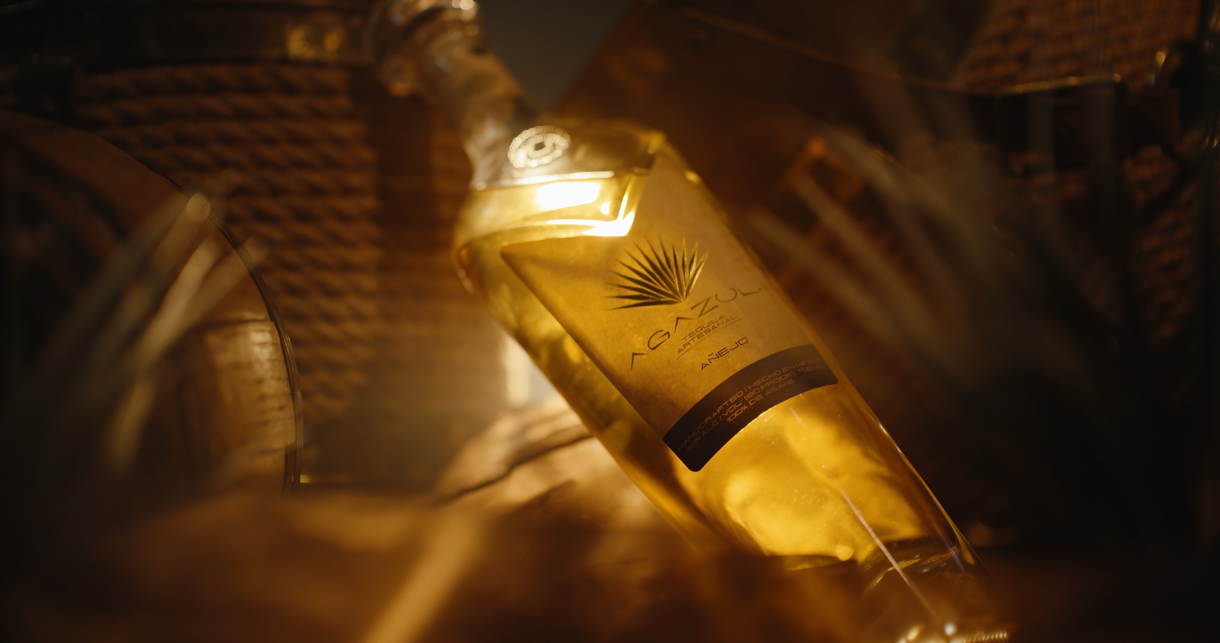 Agazul Tequila Anejo bottle profile in golden light