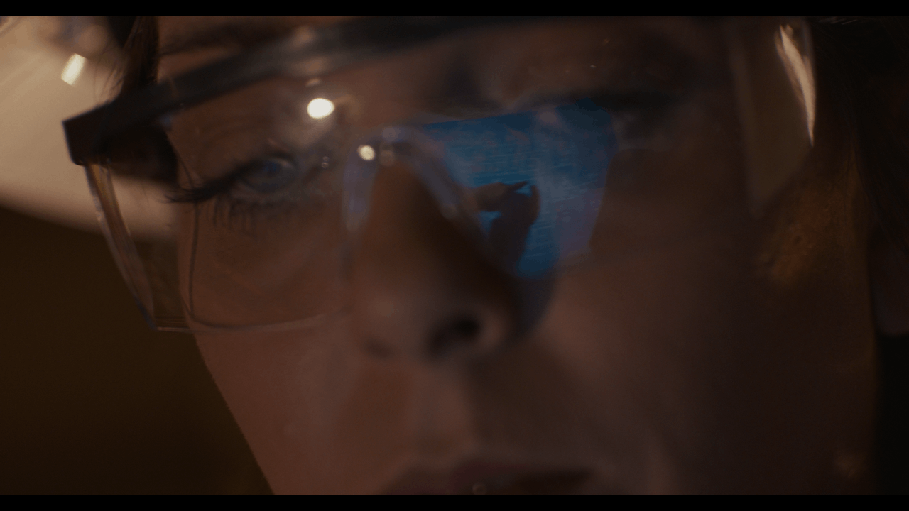 Cardboard Spaceship production — pointing at blueprints