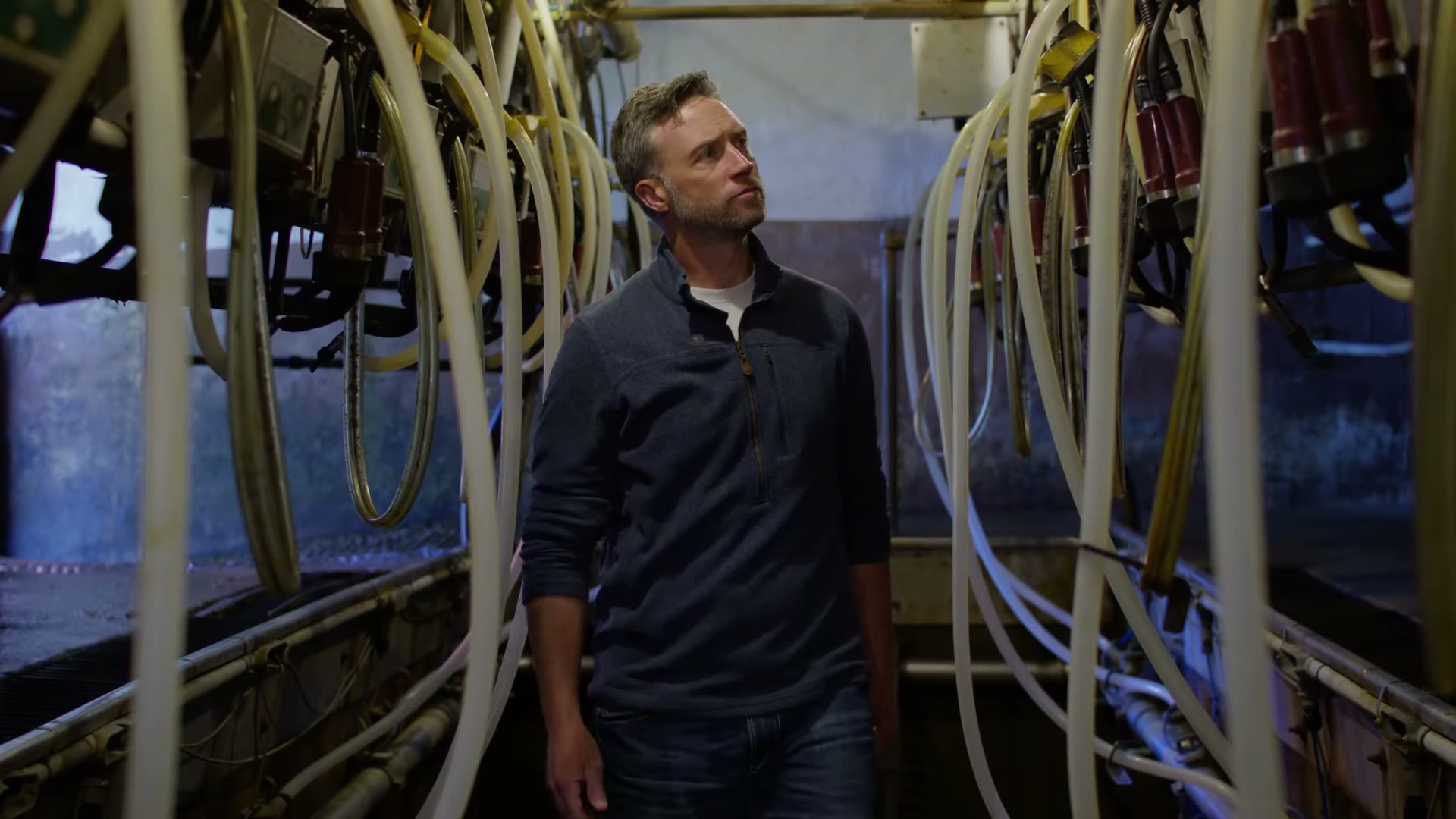 Lincoln Hough walking a dairy milking parlor