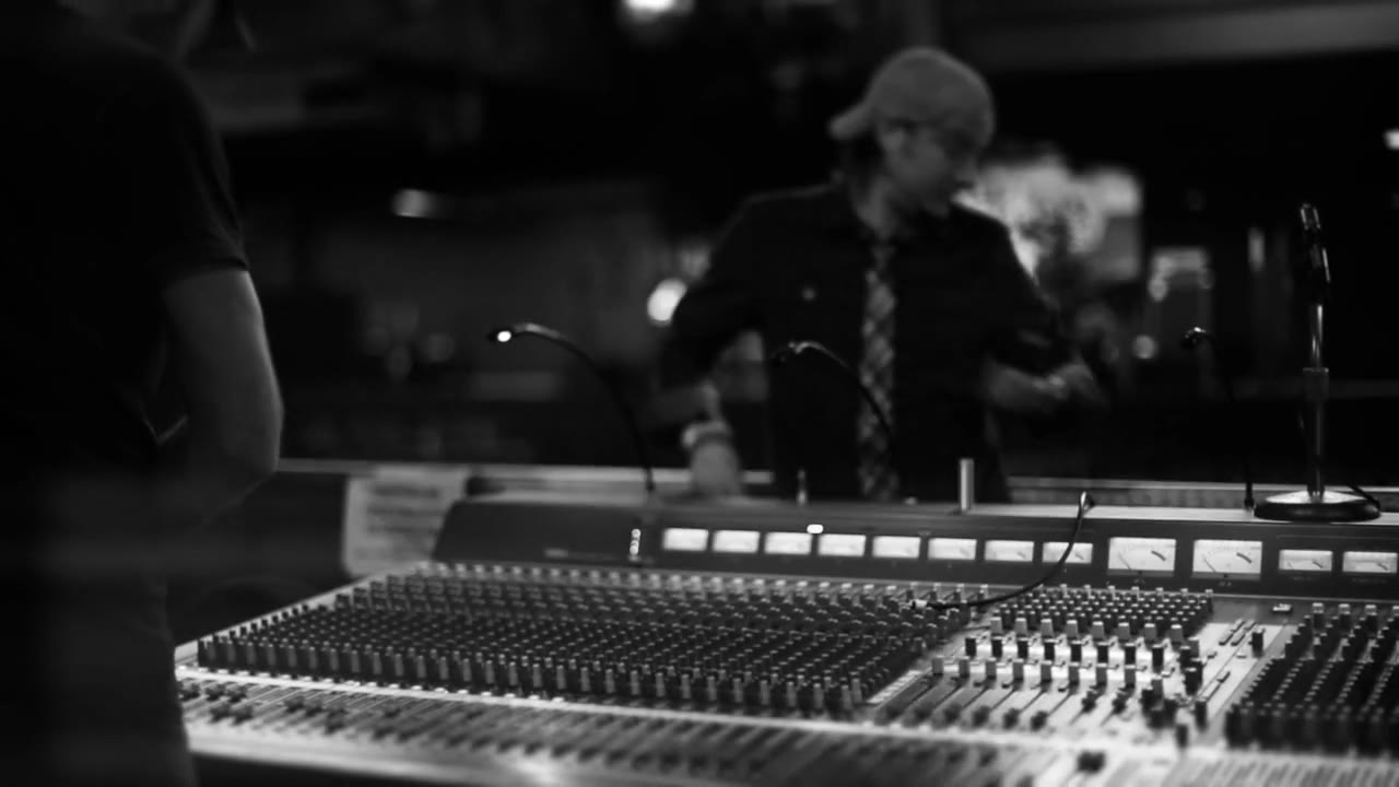 Engineer working the front of house sound console during the show