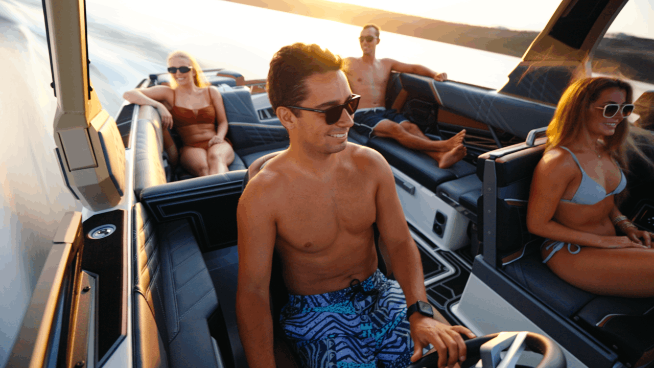 Boat driver at the helm during Tige production shoot
