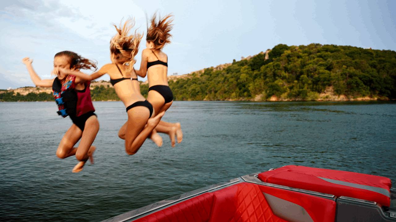 Athletes riding behind Tige Z series boat