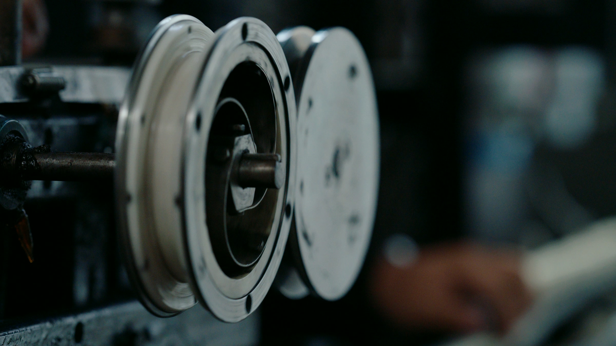 Still frame titled "Factory Machine Reel Close Detail" from the Filmsupply Factory Bike TV Construction Selects source drop.