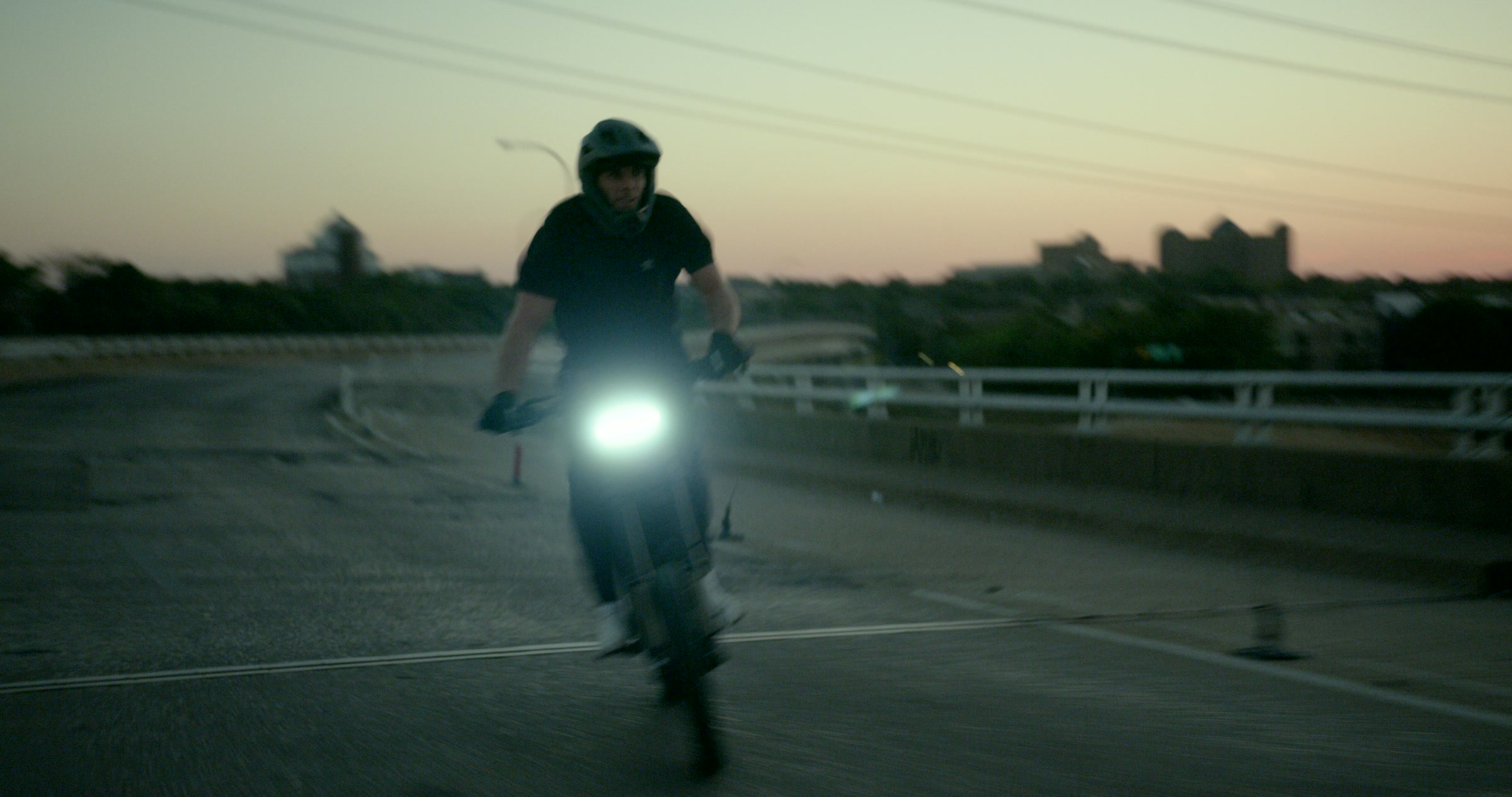 Still frame titled "Front Headlight Road Approach" from the Filmsupply Factory Bike TV Construction Selects source drop.