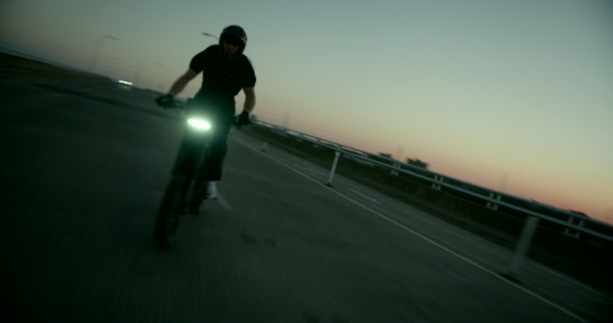 Still frame titled "Night Road Bike Lean" from the Filmsupply Factory Bike TV Construction Selects source drop.