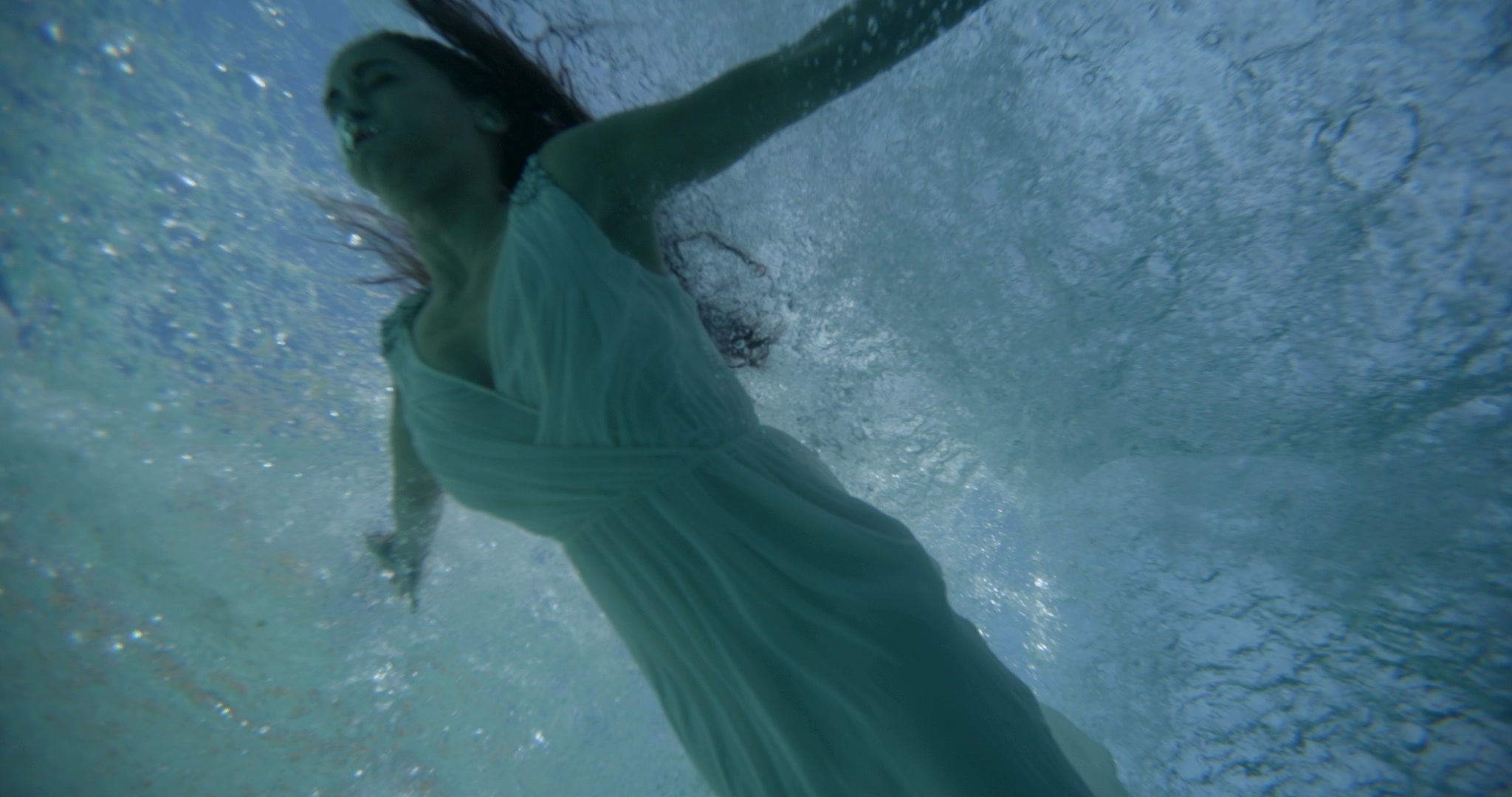 Still frame titled "Underwater Reach Through Bubbles" from the Filmsupply Factory Bike TV Construction Selects source drop.