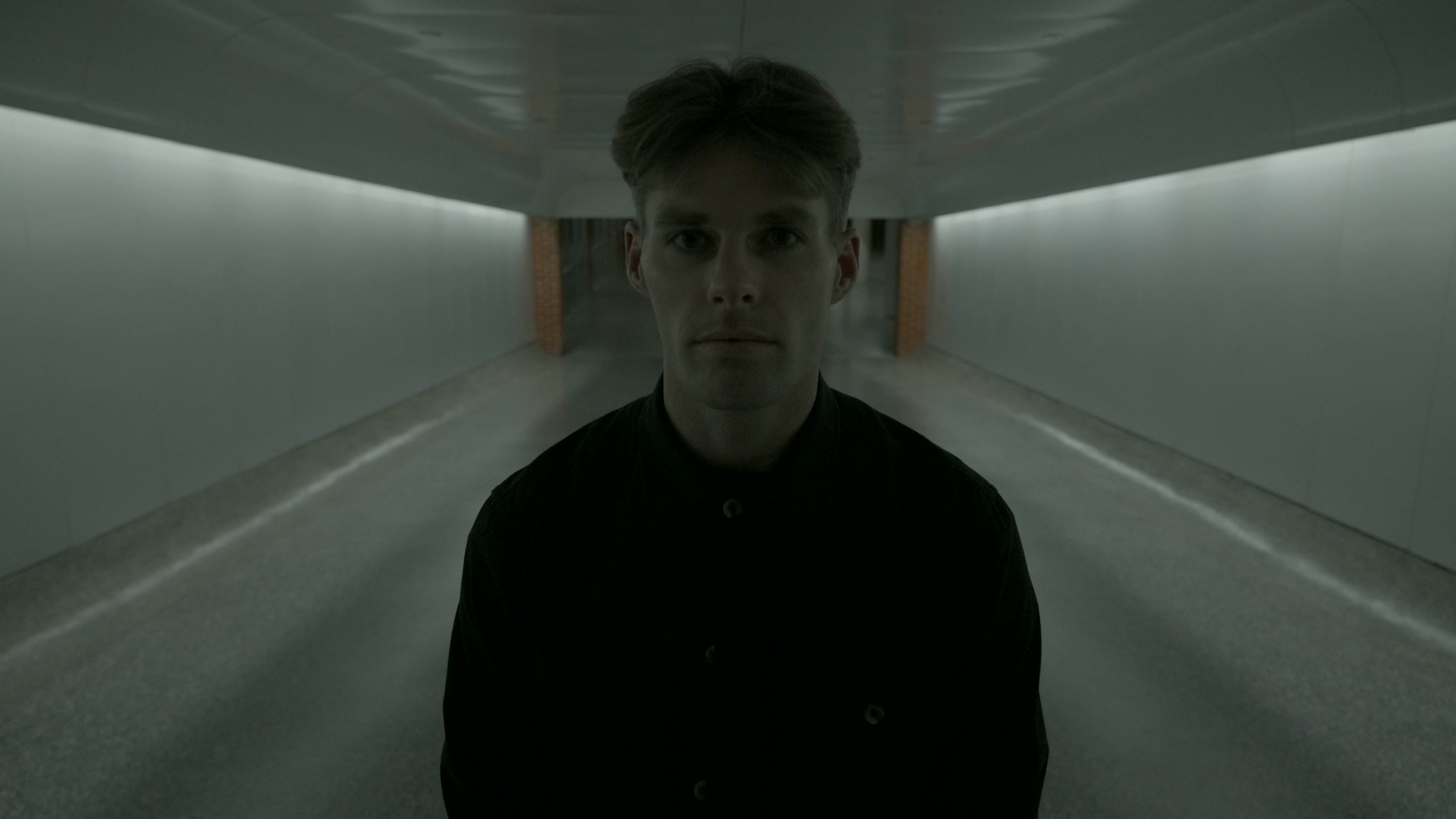 Still frame titled "White Corridor Rider Portrait" from the Filmsupply Factory Bike TV Construction Selects source drop.