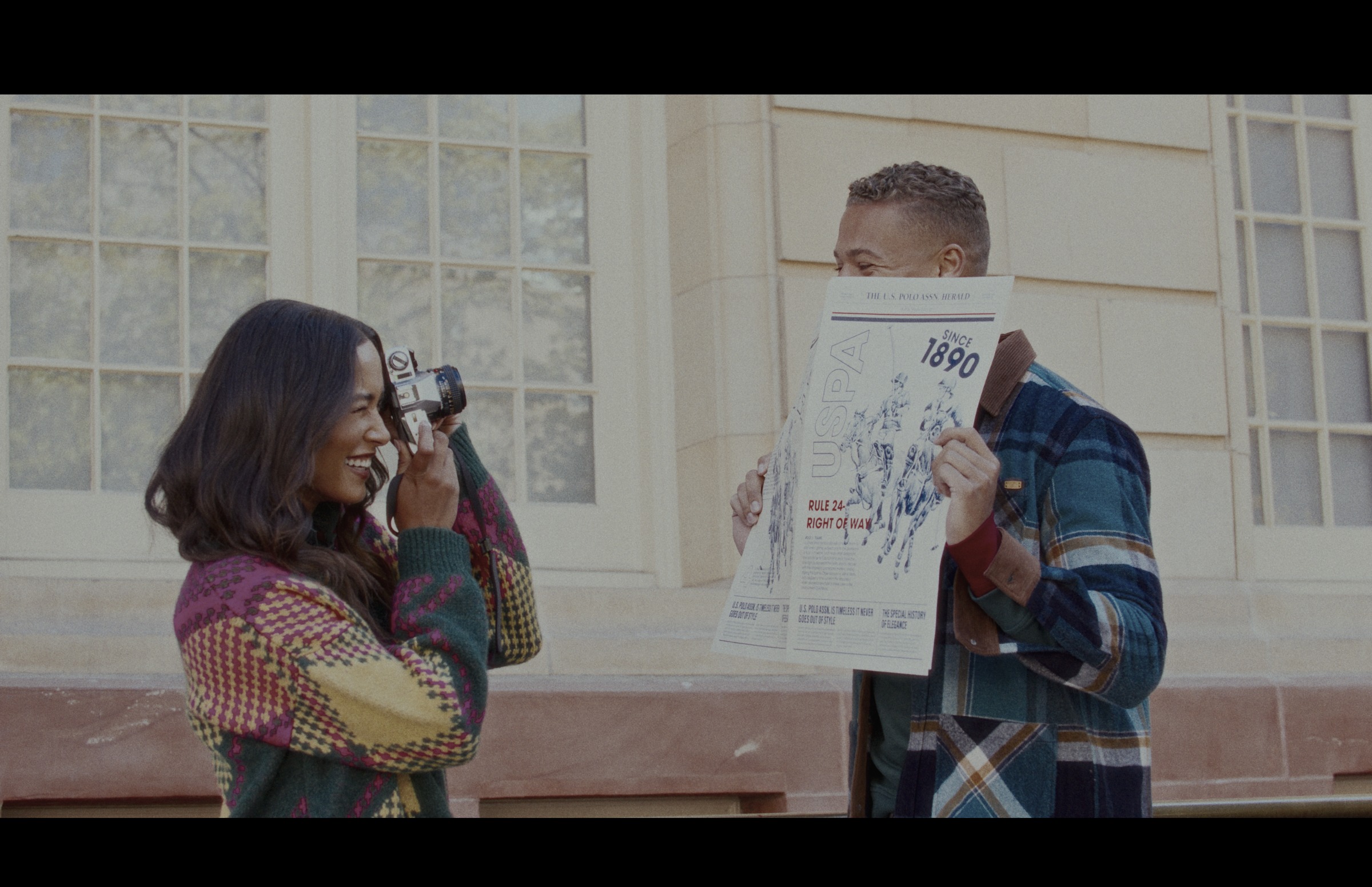 Still frame titled "Campus Map Couple" from the GLM Filmsupply Frame Grab Titles source drop.