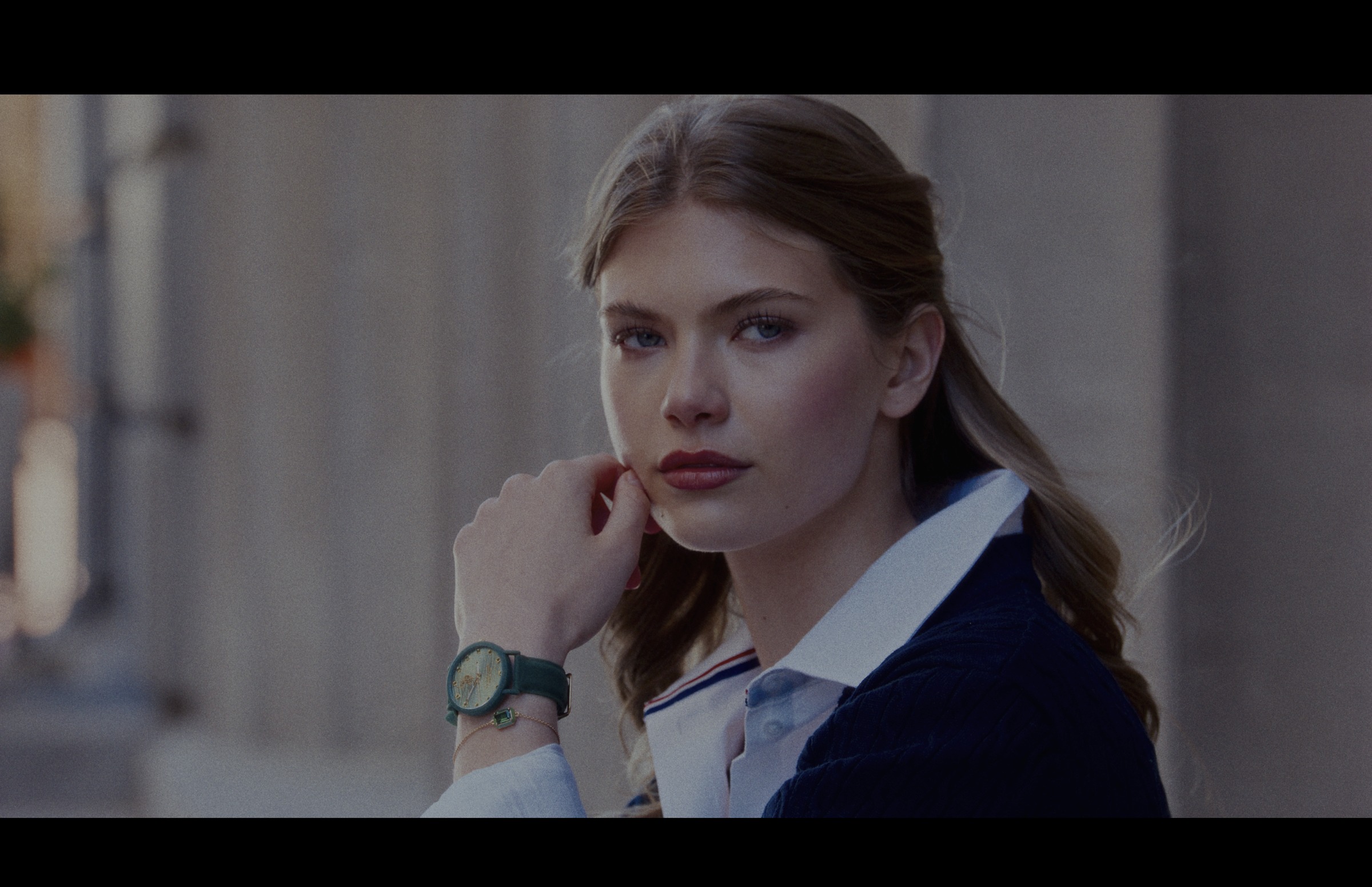 Still frame titled "Collegiate Portrait Closeup" from the GLM Filmsupply Frame Grab Titles source drop.
