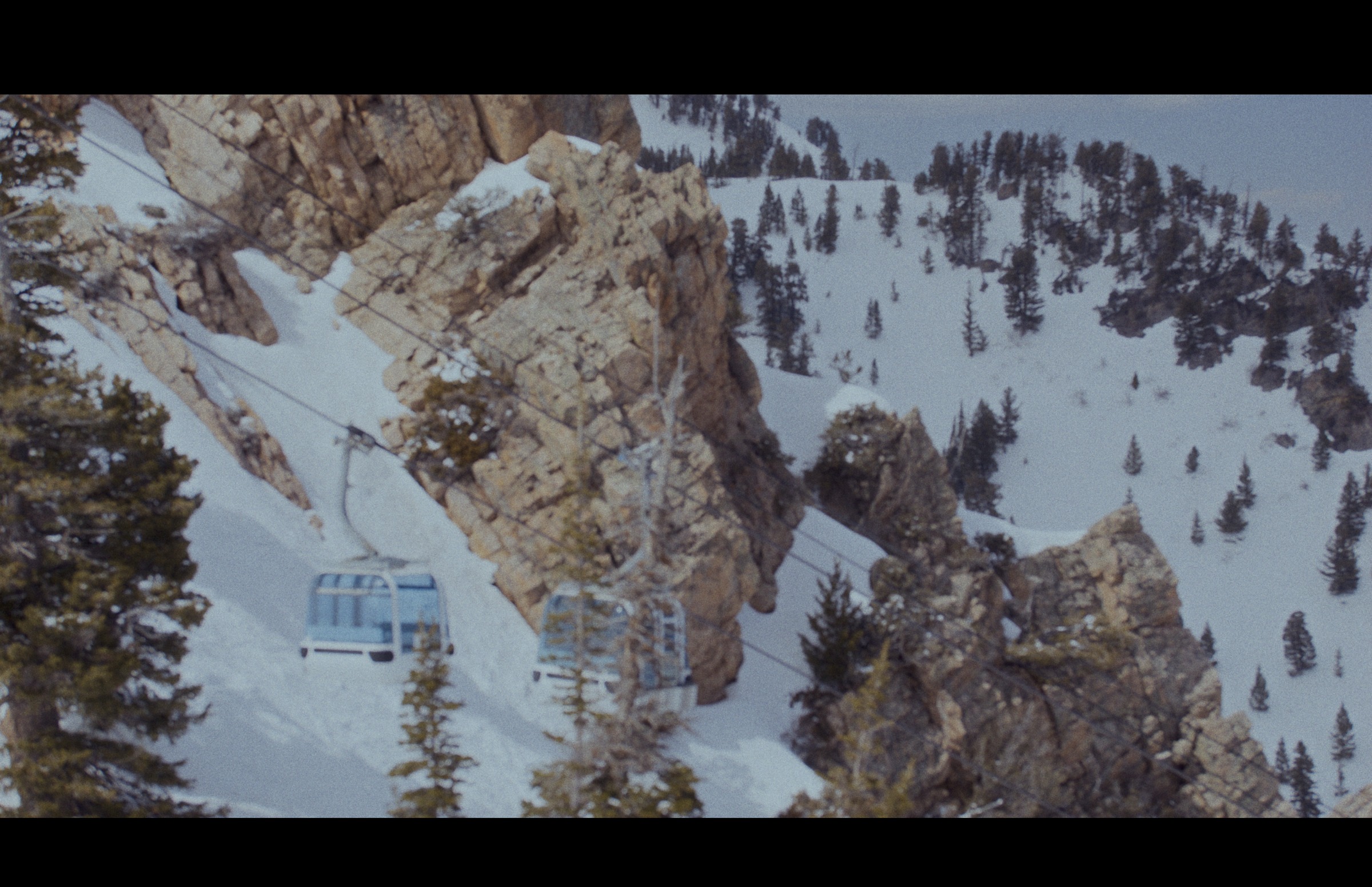 Still frame titled "Snowy Mountain Texture" from the GLM Filmsupply Frame Grab Titles source drop.