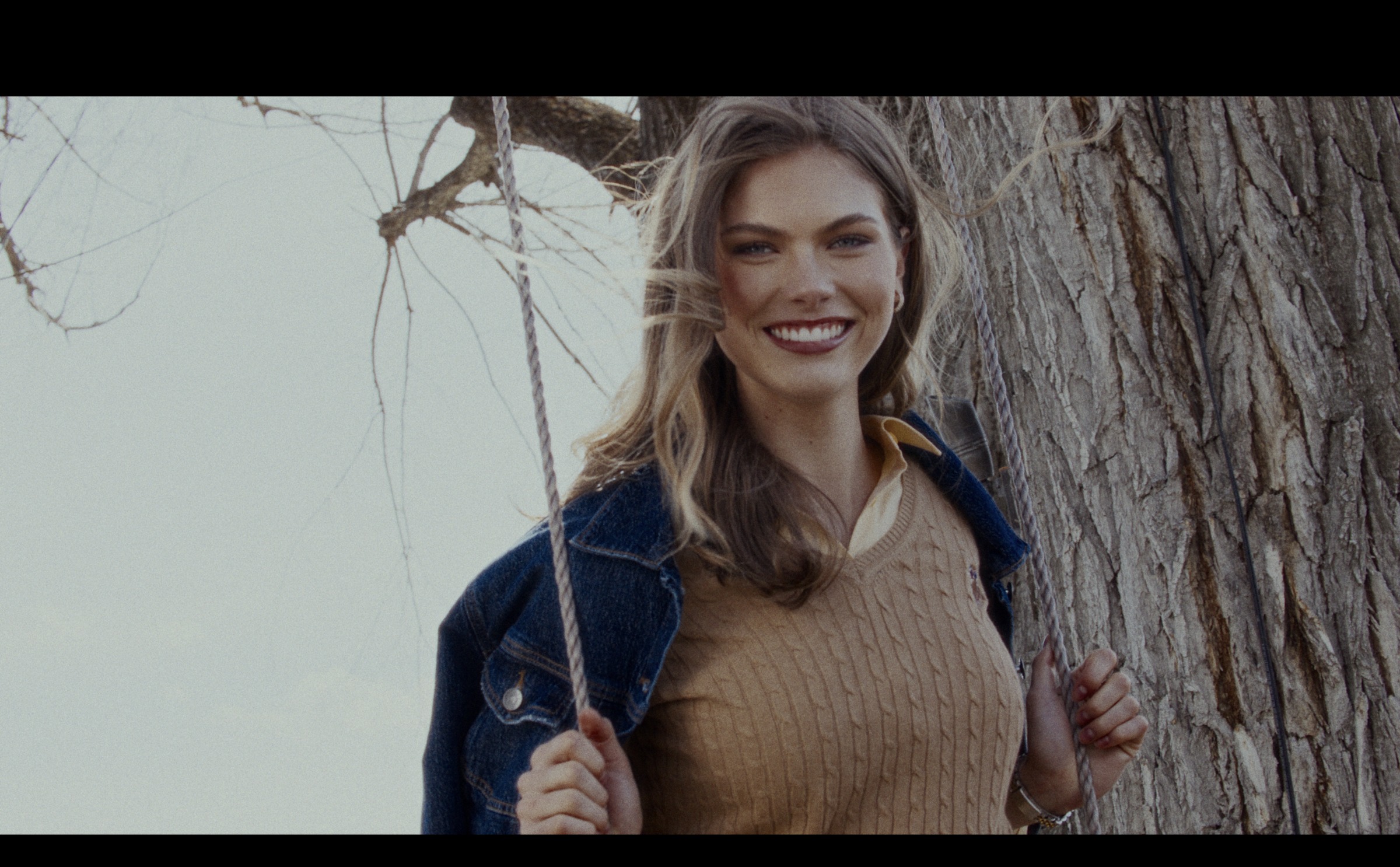 Still frame titled "Tree Swing Denim Portrait" from the GLM Filmsupply Frame Grab Titles source drop.